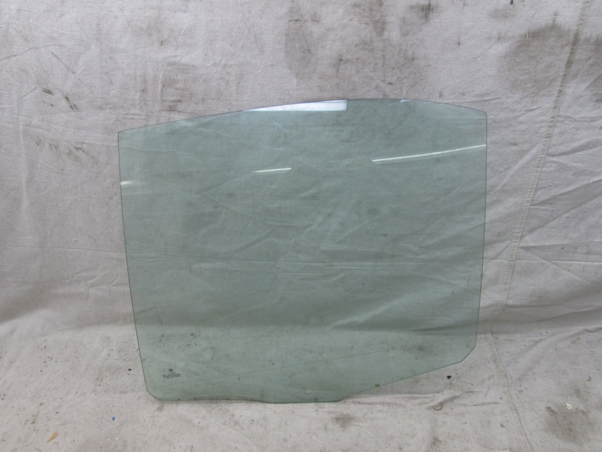 BMW E39 525i 530i 540i M5 left rear window glass (used) – Allums Imports