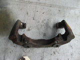 Porsche 928 84-85 left front brake caliper bracket (USED)