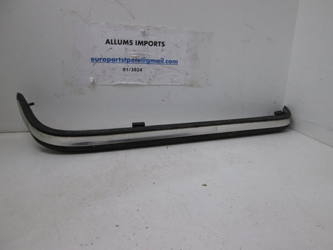 Mercedes W123 Tail Light Left Lower Molding Trim (USED)