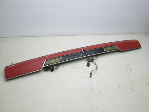 Jaguar XJS 84-91 rear trunk tag light trim panel (USED)