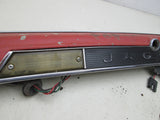 Jaguar XJS 84-91 rear trunk tag light trim panel (USED)