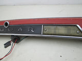 Jaguar XJS 84-91 rear trunk tag light trim panel (USED)