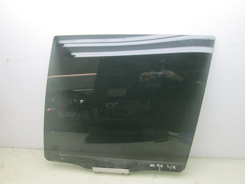 Volvo XC90 02-13 left rear window glass (USED)