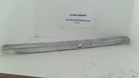 Mercedes R107 W107 Rear Panel License Plate Light Deck Lid Lock Molding 1076901580 (USED)