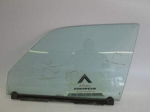 Jaguar XJ6 left front door glass 80-87