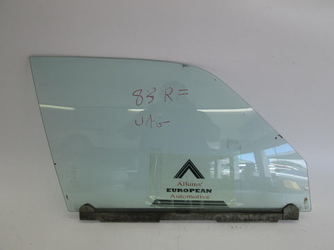 Jaguar XJ6 right front door glass 80-87