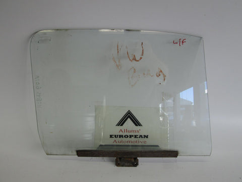 Volkswagen Beetle left front door glass 111845601A