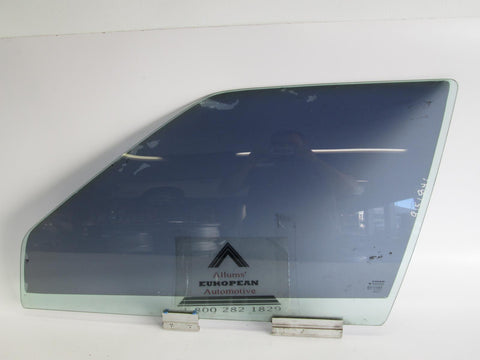 Volvo 850 left front door glass 9151841