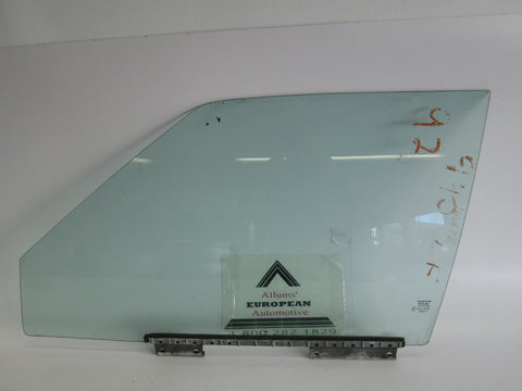 Volvo 940 left front door glass 3528791