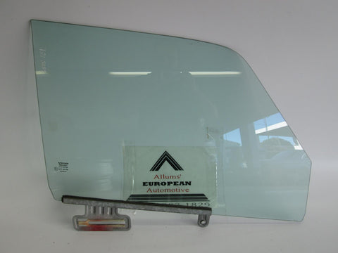 Volvo 240 right front window glass 1213059