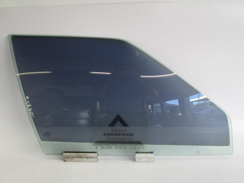 Volvo 850 right front door glass 9486011