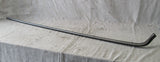 Volvo 240 sedan 86-93 left rear body quarter molding trim