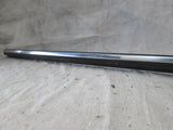 Volvo 240 sedan 86-93 left rear body quarter molding trim