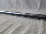 Volvo 240 sedan 86-93 left rear body quarter molding trim
