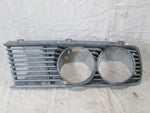 BMW E28 528e 535is Left Side Headlight Grille 51131874649 (USED)